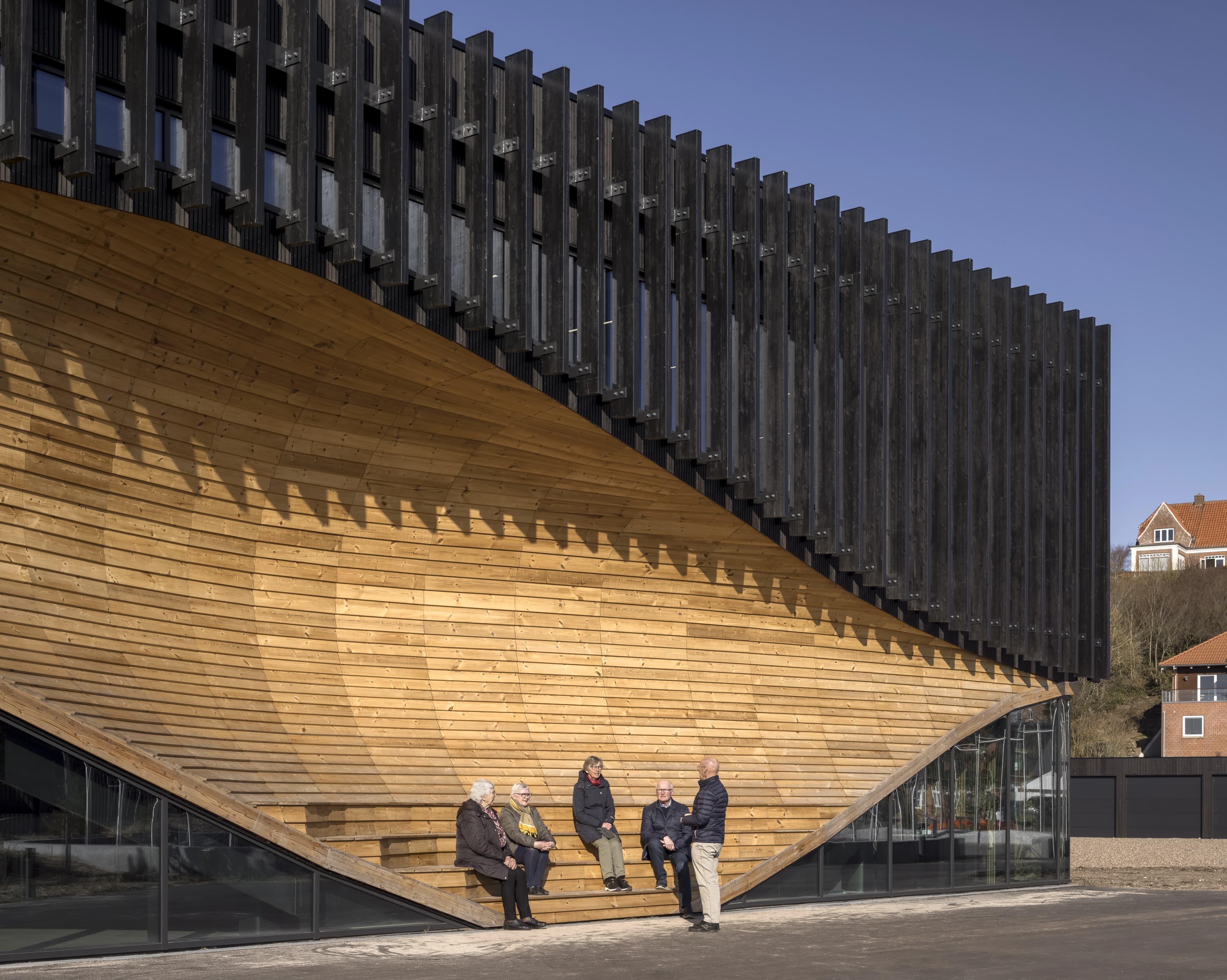Klimatorium med træ-bølgen som samlingspunkt
