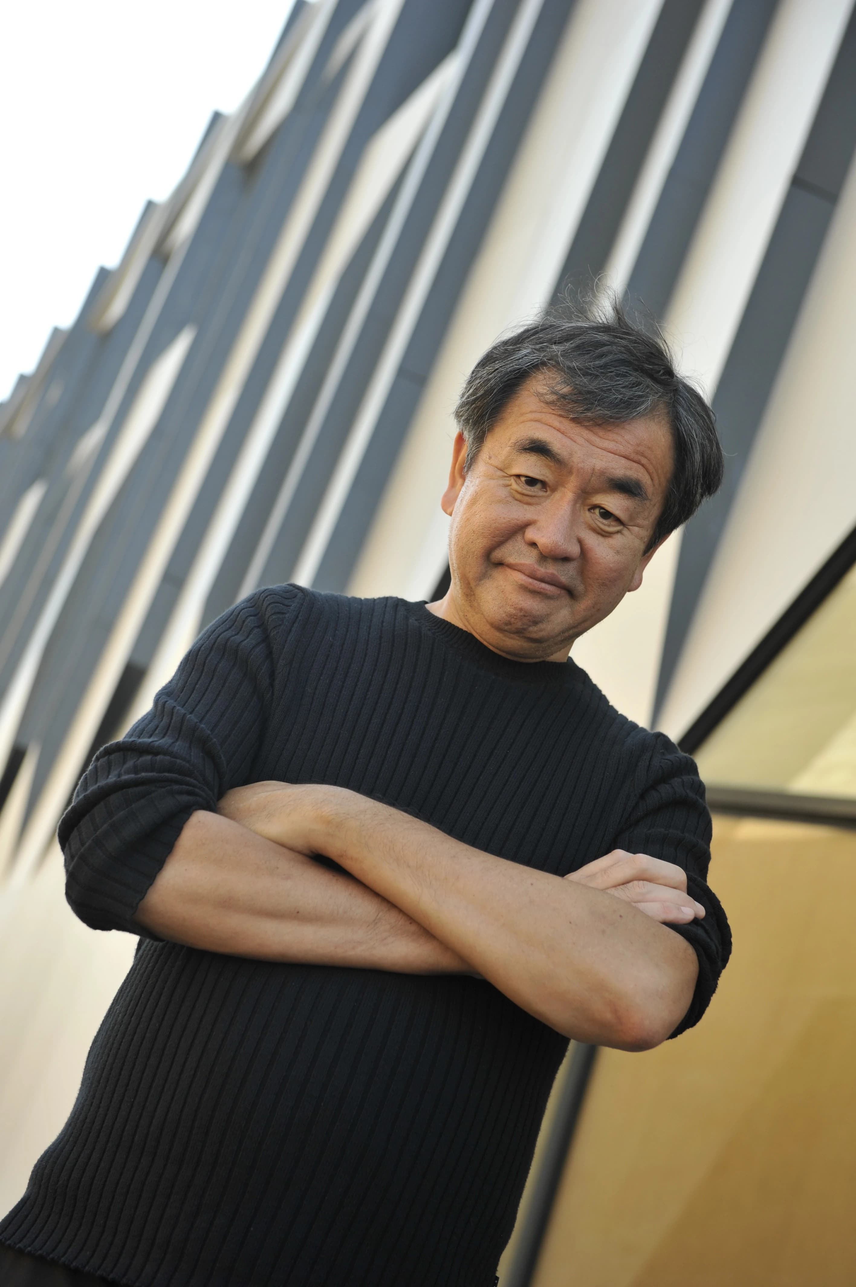 Portrætfoto af den japanske arkitekt Kengo Kuma