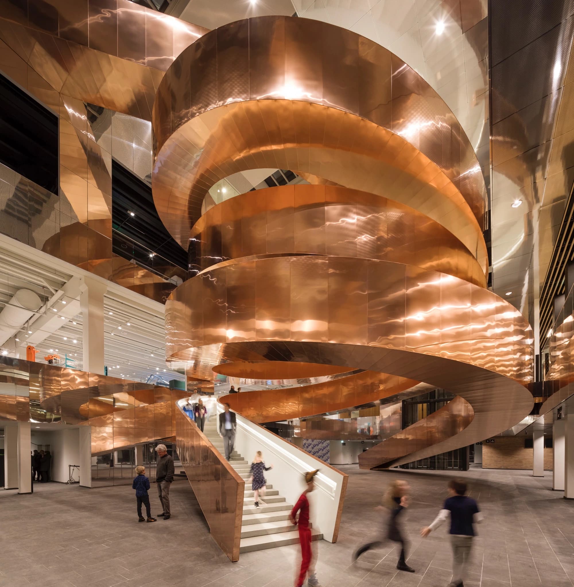 The Helix staircase clad with 10 tonnes of copper, serving as the architectural centrepiece.