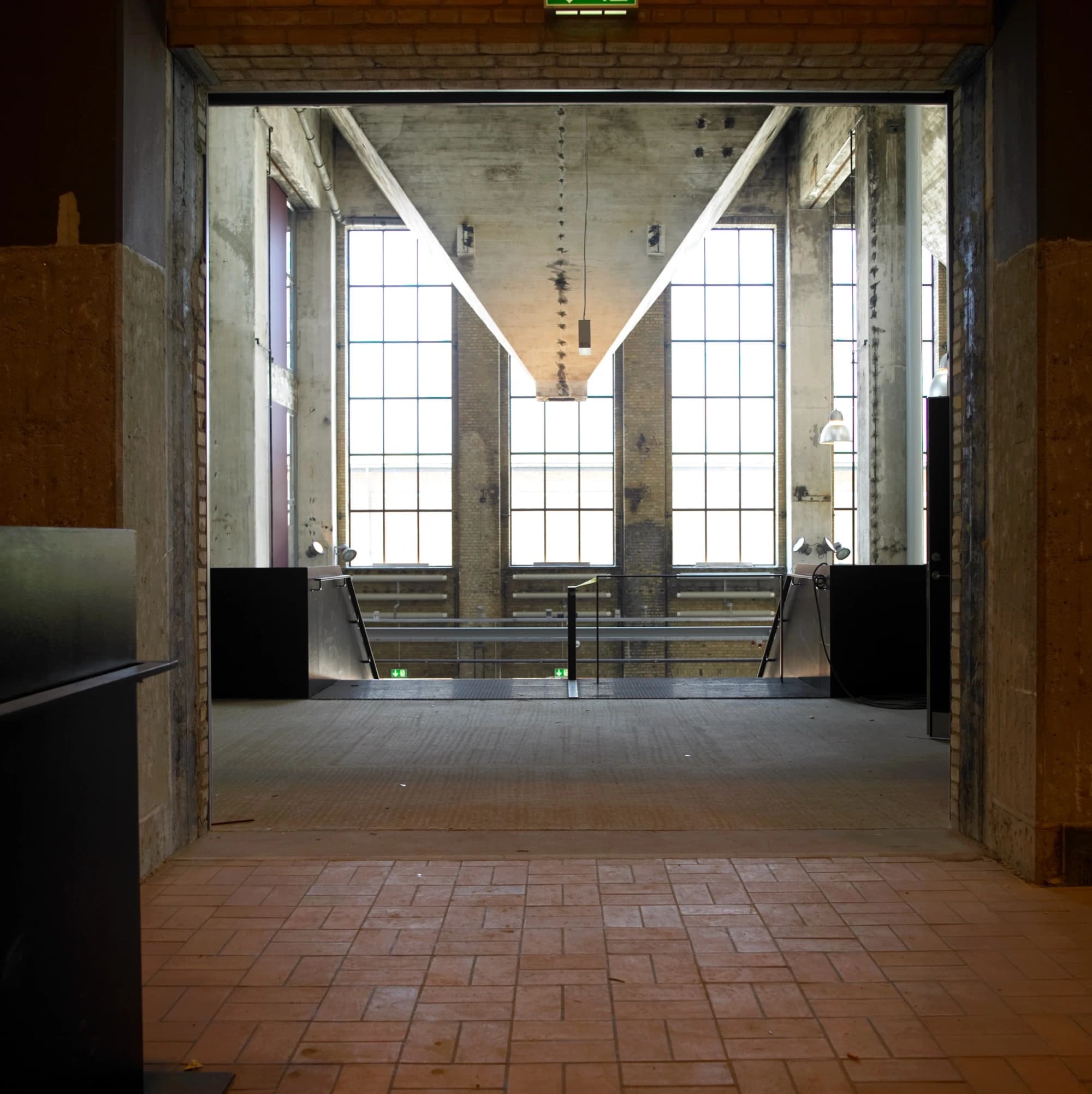 The industrial heritage: coal funnels and raw concrete pillars.