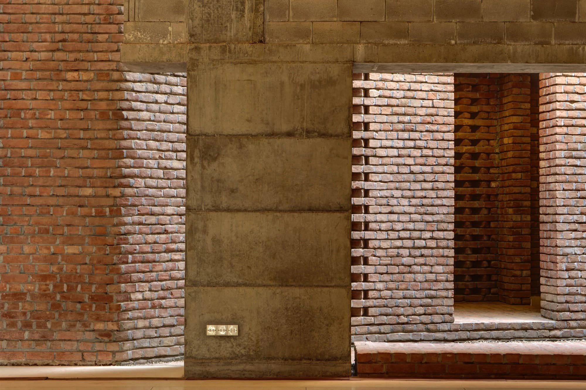 Exposed brick and concrete used to maximum effect